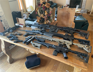 guns displayed on table